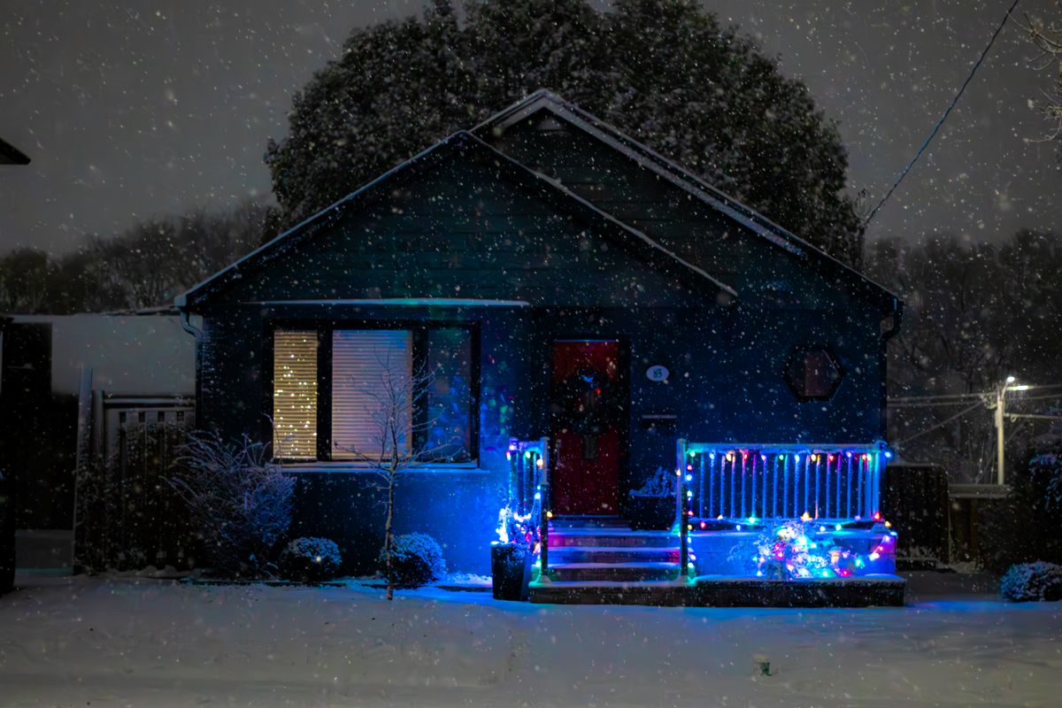 Professionally installed Christmas lights — Snowfall porch glow — <b>Lee's Summit</b>